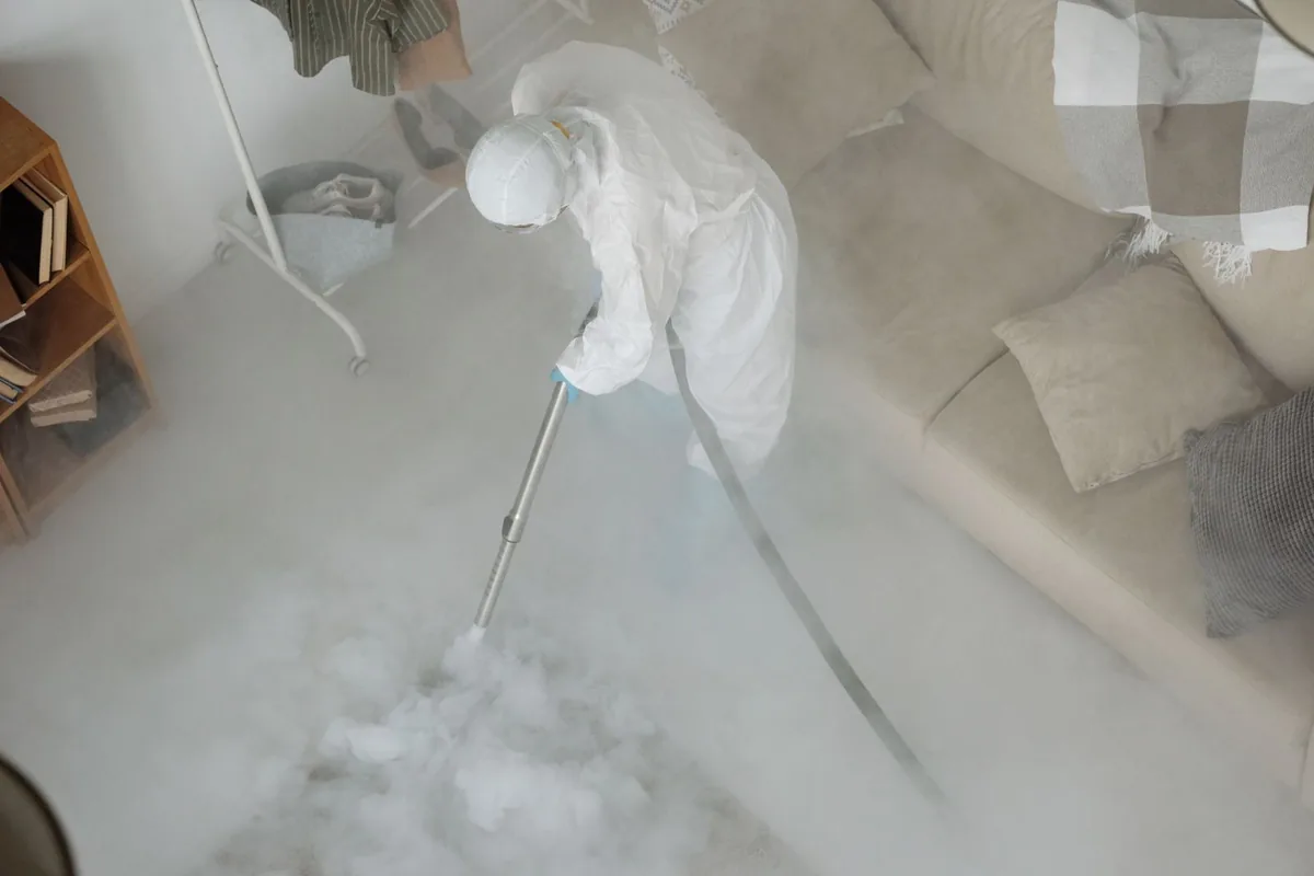 Biohazard cleanup technician in protective equipment, Shasta Lake, CA